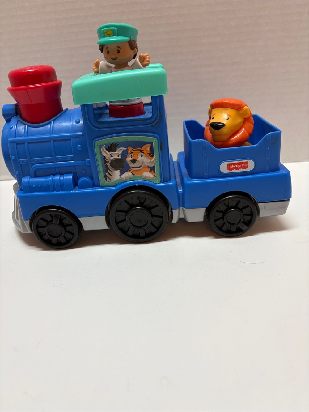 Fisher-Price Blue Pull-Along Train with Lion & Conductor Figures